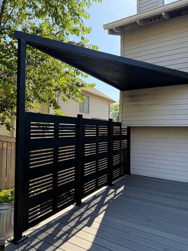 Steel patio cover frame over a composite deck